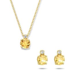 Gouden sieradensetje met citrien en diamant