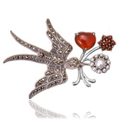 Zilveren broche vogel granaat en carneool