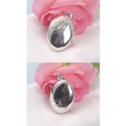 Ovale zilveren medaillon met gravering