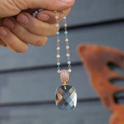 Heide Heinzendorff rosé collier blauw kristal