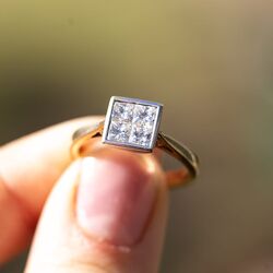 Gouden ring met prinses geslepen diamanten