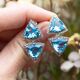 Zilveren driehoekige oorbellen blauw topaas met markasiet