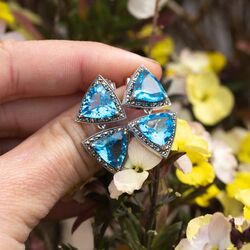 Zilveren driehoekige oorbellen blauw topaas met markasiet