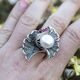 Zilveren ring Ginkgo parel met robijn markasiet