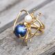 1e gehalte verguld zilveren spinring met donkerblauwe mabe parel en witte zoetwaterparel