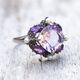Zilveren ring met grote amethist en diverse kleine amethist en zaadpareltjes uit de Zilver.nl Home Collection