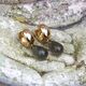 Gouden creolen met maansteen aanhangers 14 karaat van Heide Heinendorff, verwissel je oorbellen dagelijks van kleur