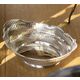 Een zilveren broodmand is een sieraad op tafel gemaakt door Jan Krins