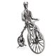 Groot zilveren miniatuur man op fiets velocipede