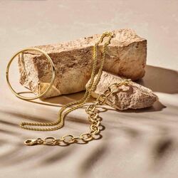 Gouden bangle met zilveren kern