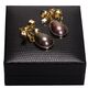 Gouden vintage oorbellen met Mabe parels onder een strik